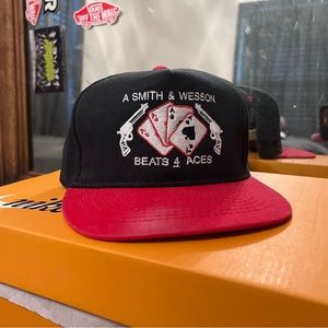 A Smith & Wesson Beat 4 Aces OTTO CAP